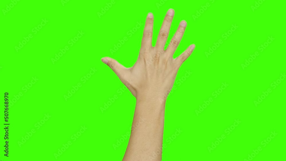 Hands grabbing on a green screen