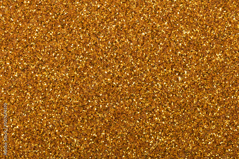 New glitter background in attractive gold tone, stylish texture for Christmas desktop. New glitter background in attractive gold tone, stylish texture for Christmas desktop.