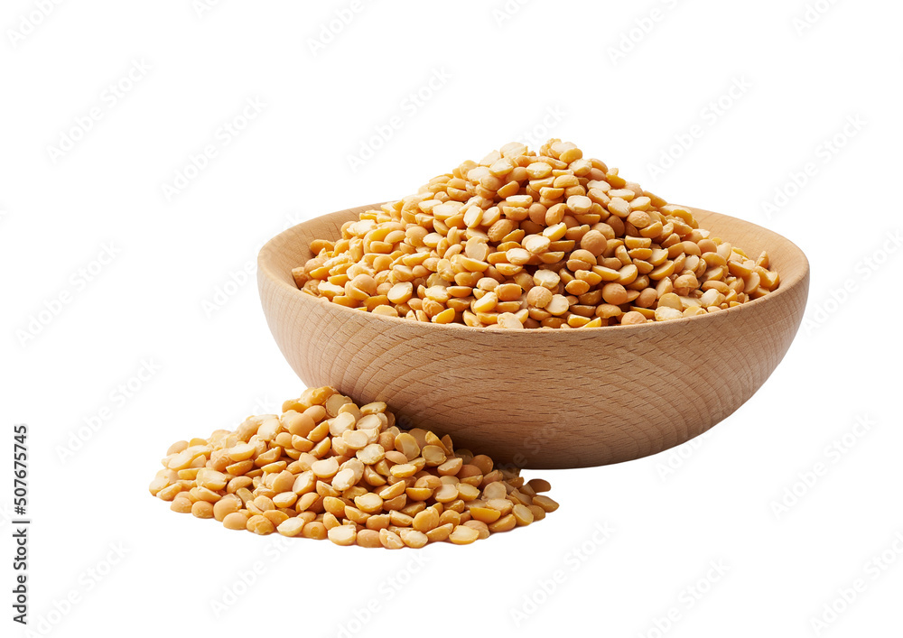 dried peas in a wooden bowl isolated on white background.