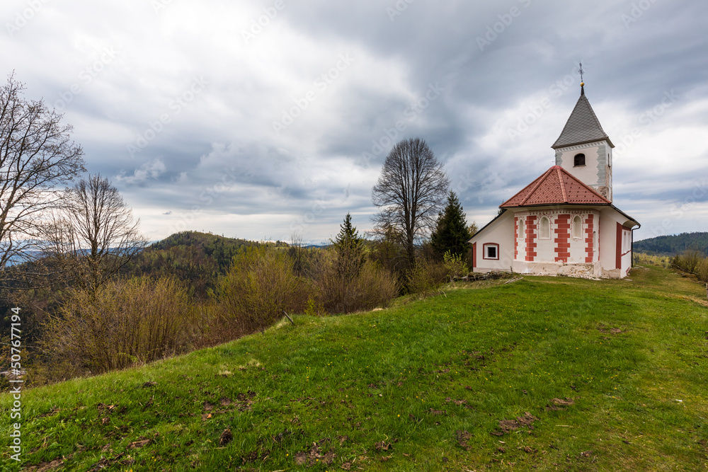 tiny church on the hillside