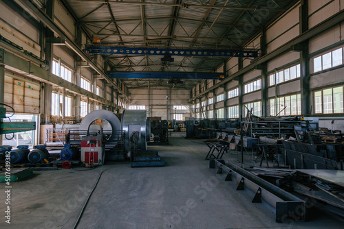 Metalworking factory production line. Manufactured metal parts