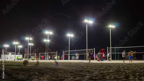 dubai famous night light jumeirah beach park volleyball grounds panorama 4k time lapse uae photo