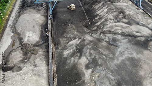 Aerial shot of a large ash dump created by burning a large amount of coal. Located near the city center
