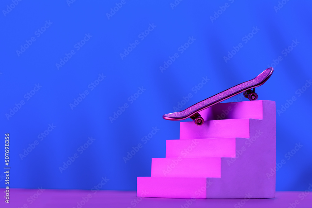 Skate in pink on the stairs, as a symbol of extreme sports