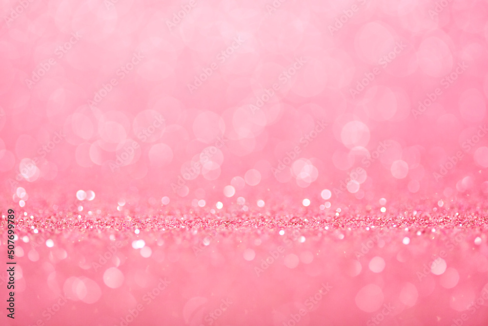 Romantic pastel pink defocused background with glitter sparkles and circle bokeh. Romantic pastel pink defocused background with glitter sparkles and circle bokeh.