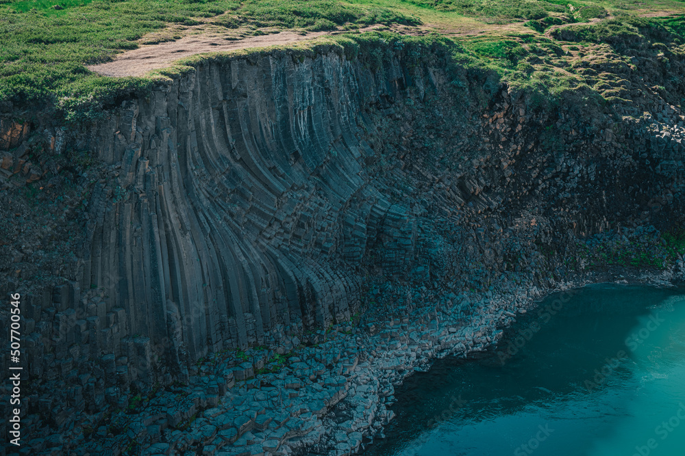 Φωτογραφία Aerial drone panorama of studlagil canyon in Iceland, picturesque valley with basalt columns standing high on a warm summer day