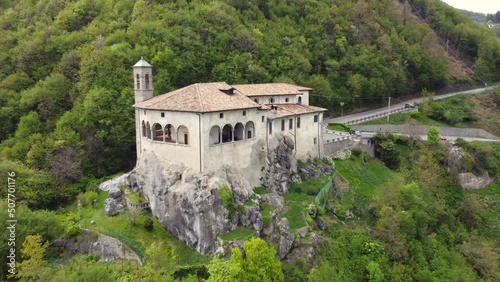 Wallpaper Mural Aerial footage view from the drone of the Sanctuary of St. Patrick (San Patrizio) built on the sheer cliff, Colzate, Bergamo, Italy Torontodigital.ca