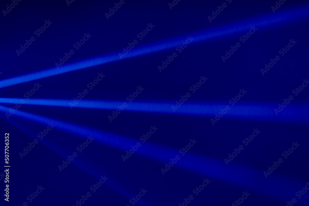 Blue light flare prism rainbow flares overlay effect on black background, light crossing crystals, prismatic sun catcher reflections rays. Abstract blurred colourful lens flare bokeh on dark backdrop Blue light flare prism rainbow flares overlay effect on black background, light crossing crystals, prismatic sun catcher reflections rays. Abstract blurred colourful lens flare bokeh on dark backdrop