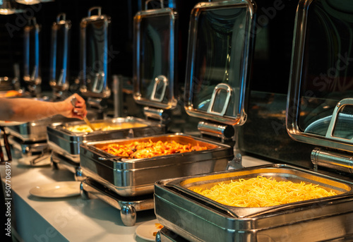 Buffet heated trays ready for service with pasta choice for breakfast