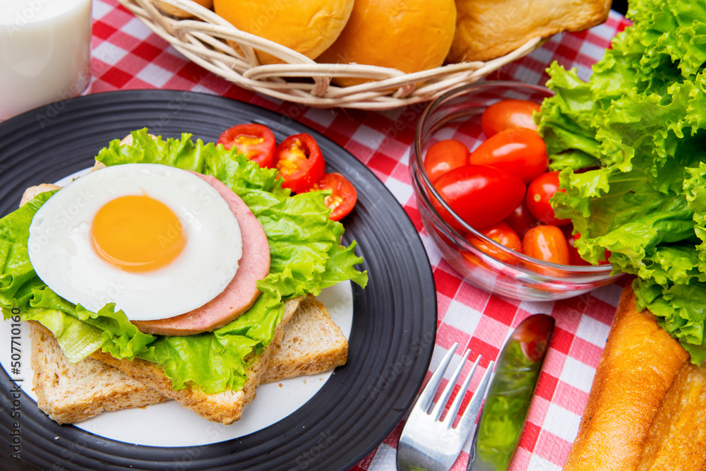 Close up of a delicious egg sandwich on dining table Close up of a delicious egg sandwich on dining table