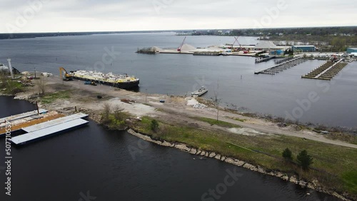 Ships anchored at a rehab dock for repairs in Muskegon lake. photo