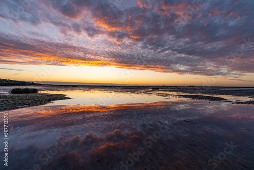 Inspirational calm sea with sunset sky. Meditation ocean and sky background. Colorful horizon over the water