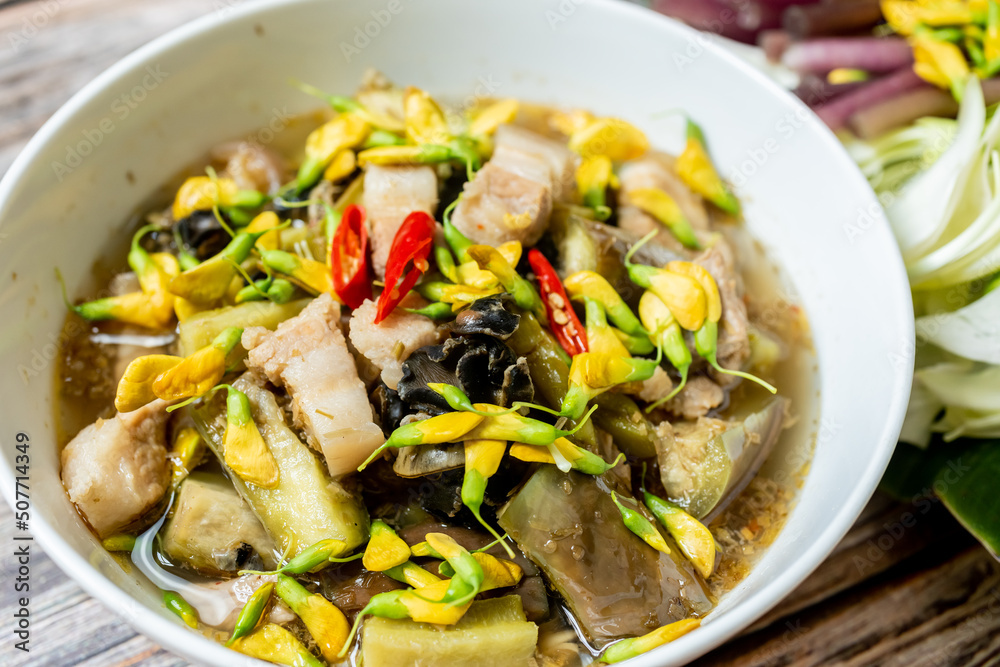 Vietnam traditional street food bun mam vermicelli noodles soup bowl (VIETNAMESE FERMENTED FISH NOODLE SOUP)