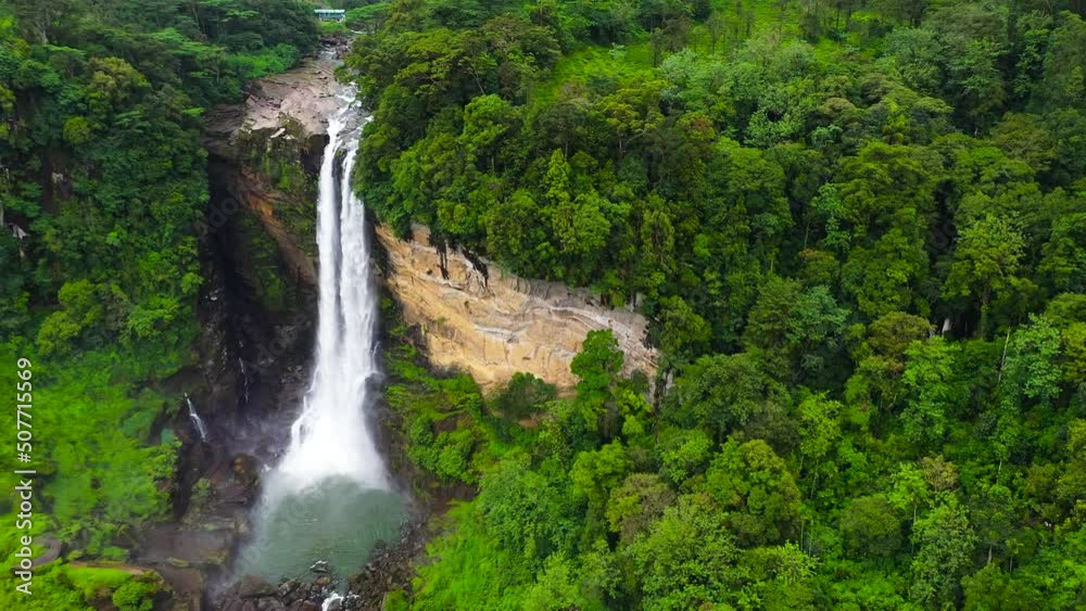 Waterfall in the rainforest, jungle. Aerial drone of Laxapana Falls, Sri Lanka Waterfall in the rainforest, jungle. Aerial drone of Laxapana Falls, Sri Lanka