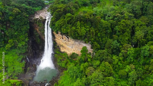 Waterfall in the rainforest, jungle. Aerial drone of Laxapana Falls, Sri Lanka photo