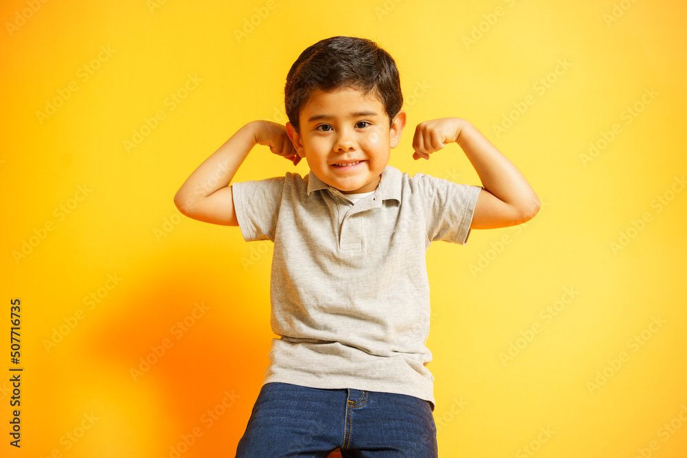 boy smiling raising his arms boy smiling raising his arms