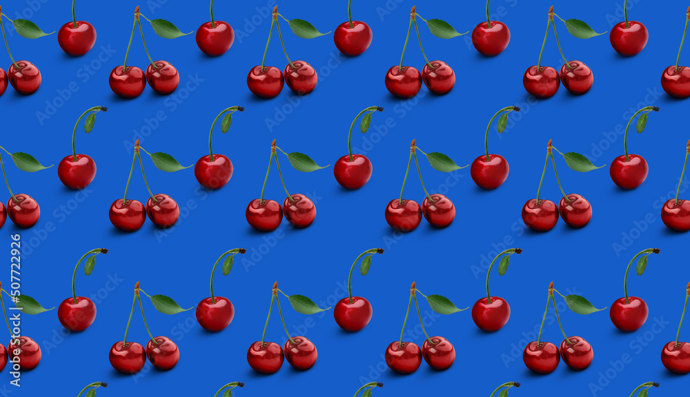 Many ripe cherries on blue background. Pattern for design Many ripe cherries on blue background. Pattern for design
