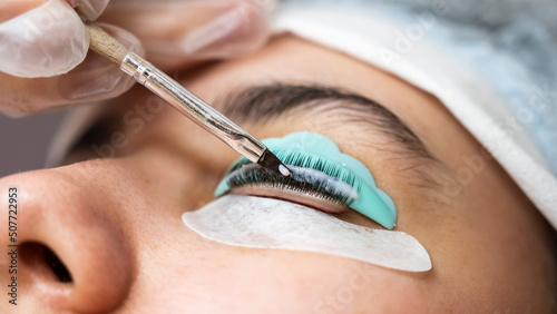 Tableau sur toile Close-up portrait of a woman on eyelash lamination procedure.