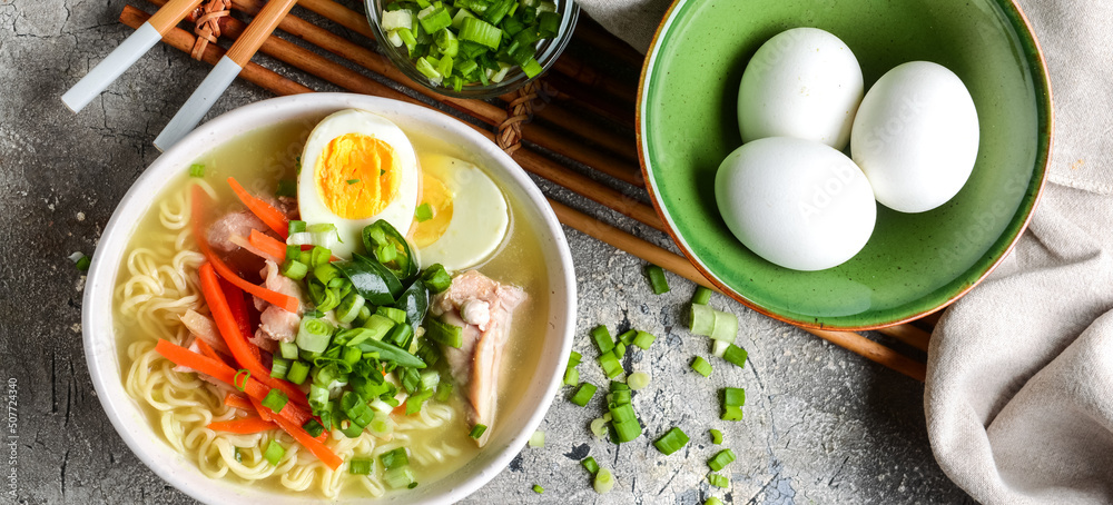 Tasty Chinese soup on grunge background Tasty Chinese soup on grunge background