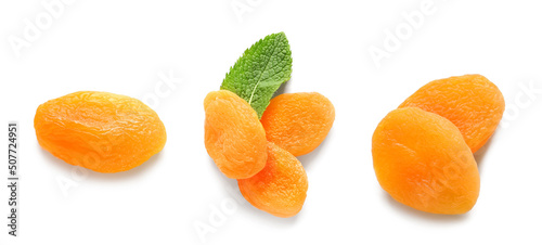 Set of tasty dried apricots isolated on white