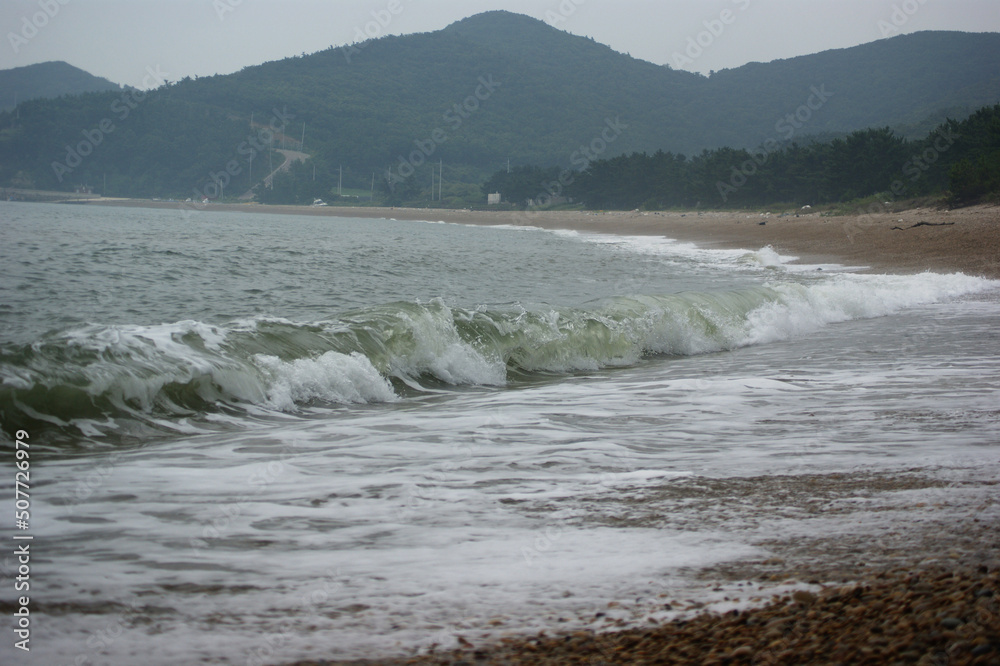 Rough waves are hitting the beach. Rough waves are hitting the beach.