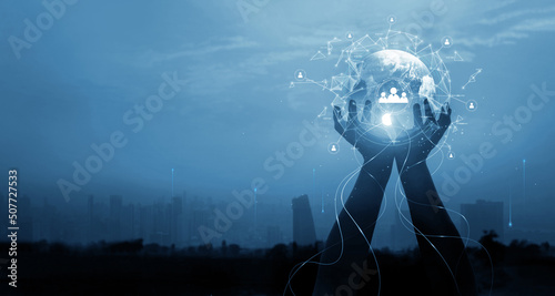 Businessman hold earth and global customer networking connection, analysis and data exchanges, social media marketing, internet technology, global business and communication network concept, blue tone