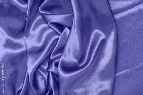 Purple crumpled fabric as background