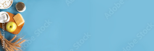 Close up of diary products on blue background photo