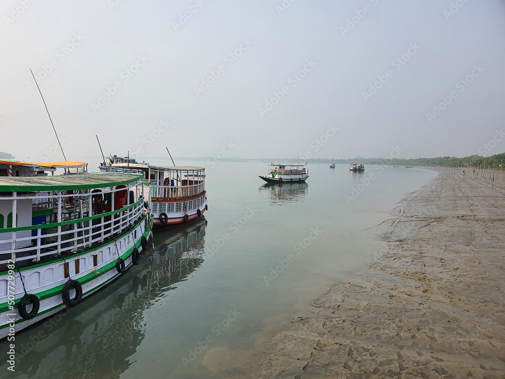 Sundarban, West Bengal, India - December 27, 2021: Boats in river at sundarbans national park