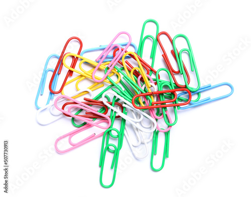 Colorful paper clips on whi...