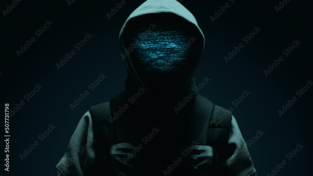 Computer hacker with hoodie and glitch face. Computer abstract digital code. Darknet fraud and cryptocurrency bitcoin concept. Cybersecurity and data protection in social network