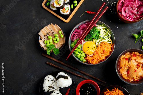Obraz na płótnie Assortment of Korean food on dark background.