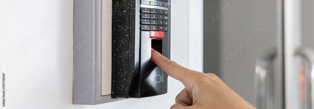 Finger print scan, Male employees press sensors to record company attendance time and after work, Time Recorder Attendance - Out work, Encryption for identity verification or electronic signing Finger print scan, Male employees press sensors to record company attendance time and after work, Time Recorder Attendance - Out work, Encryption for identity verification or electronic signing