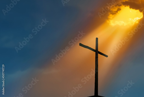 Fotobehang Christian cross over beautiful sunset background