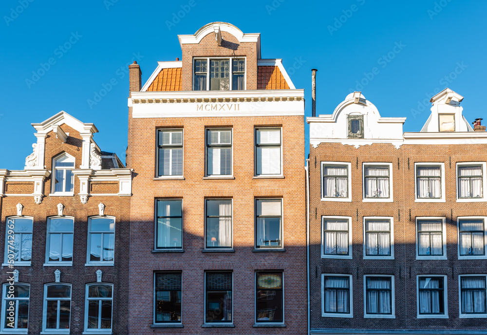 Typical merchant house facade in Amsterdam, Netherlands.