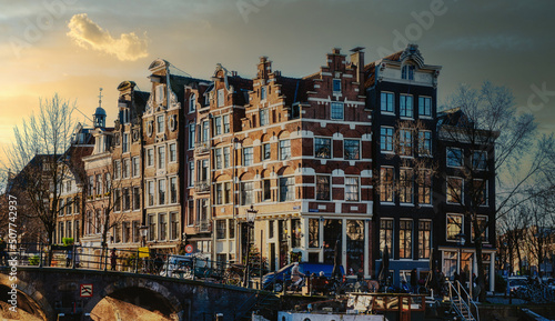 Beautiful image of the UNESCO world heritage canals the 'Brouwersgracht' en 'Prinsengracht (Prince's canal)' in Amsterdam, the Netherlands photo