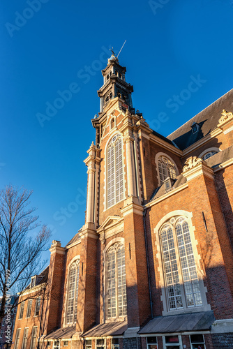 Canvas Print The old protestant Westerkerk church in Amsterdam, located on the Prinsengracht
