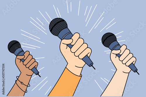Diverse people with microphones go for freedom of speech