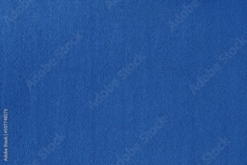 Dark blue cotton fabric cloth texture for background, natural textile pattern.