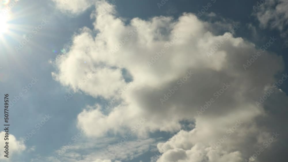 Stratocumulus grey clouds timelapse with a blue sky on a background Stratocumulus grey clouds timelapse with a blue sky on a background