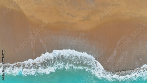 The Summer tropical background with seascape with beach waves from aerial Top view from drone. Travel concept