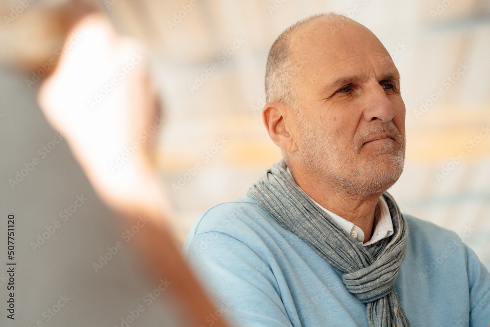 Thoughtful senior businessman in office Thoughtful senior businessman in office