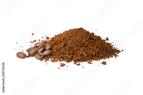 Pile of coffee grind (ground coffee) with coffee beans isolated on white background. photo