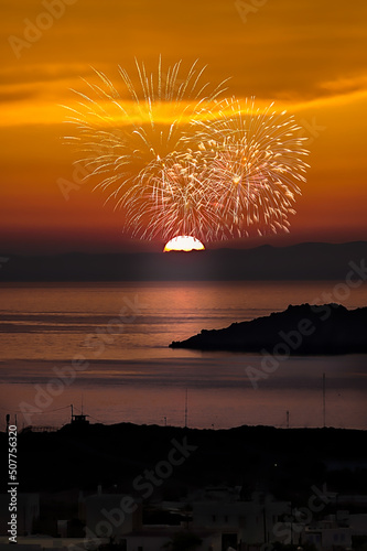 Fireworks At Sunset. Copy Space.Golden hour in the sky with dazzling fireworks. Stock Image.