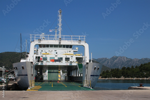 Car ferry boat shipping between islands (Ploce, Croatia) photo