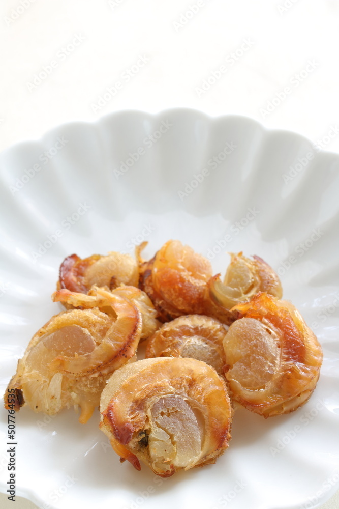 Japanese snack food, dried Hokkaido scallop on white dish