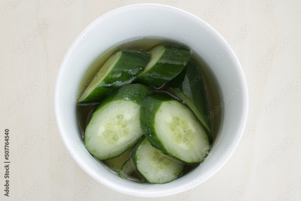 chopping cucumber in vinegar for Japanese food image chopping cucumber in vinegar for Japanese food image