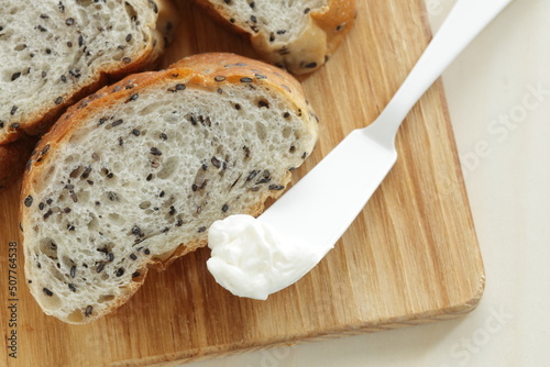 Sliced sesame French bread with cream cheese