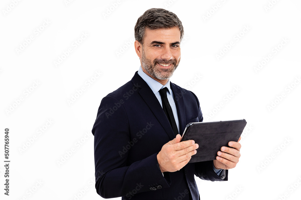 Businessman using tablet and looking at camera on white background Businessman using tablet and looking at camera on white background