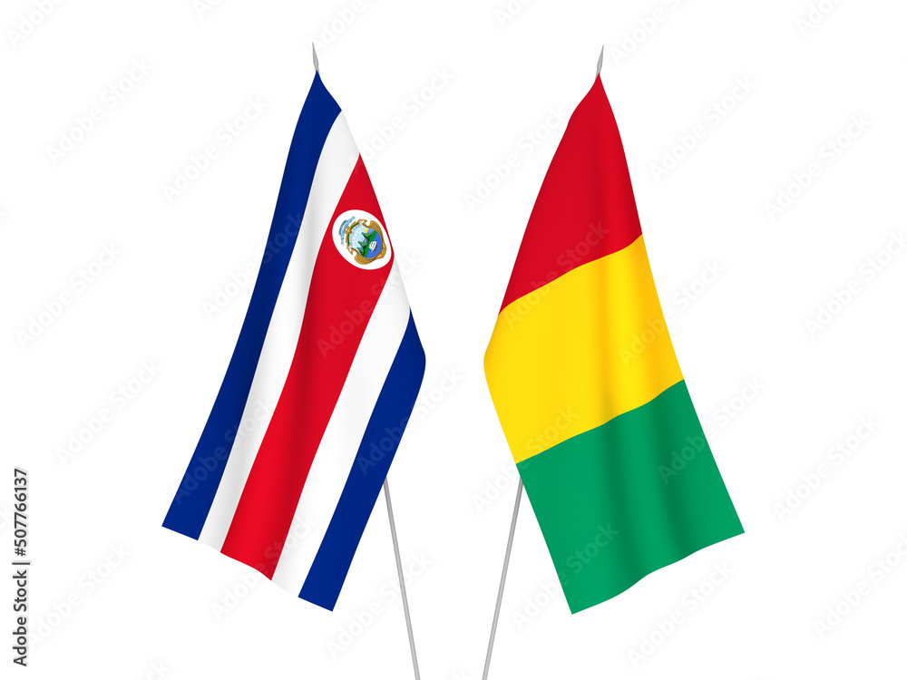 National fabric flags of Guinea and Republic of Costa Rica isolated on white background. 3d rendering illustration.